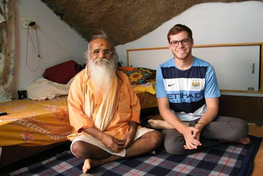 Third-year student Wade Oakley and religious teacher Swamiji 