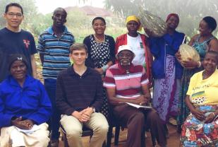 Student Cameron Haddad poses with a group of South Africans